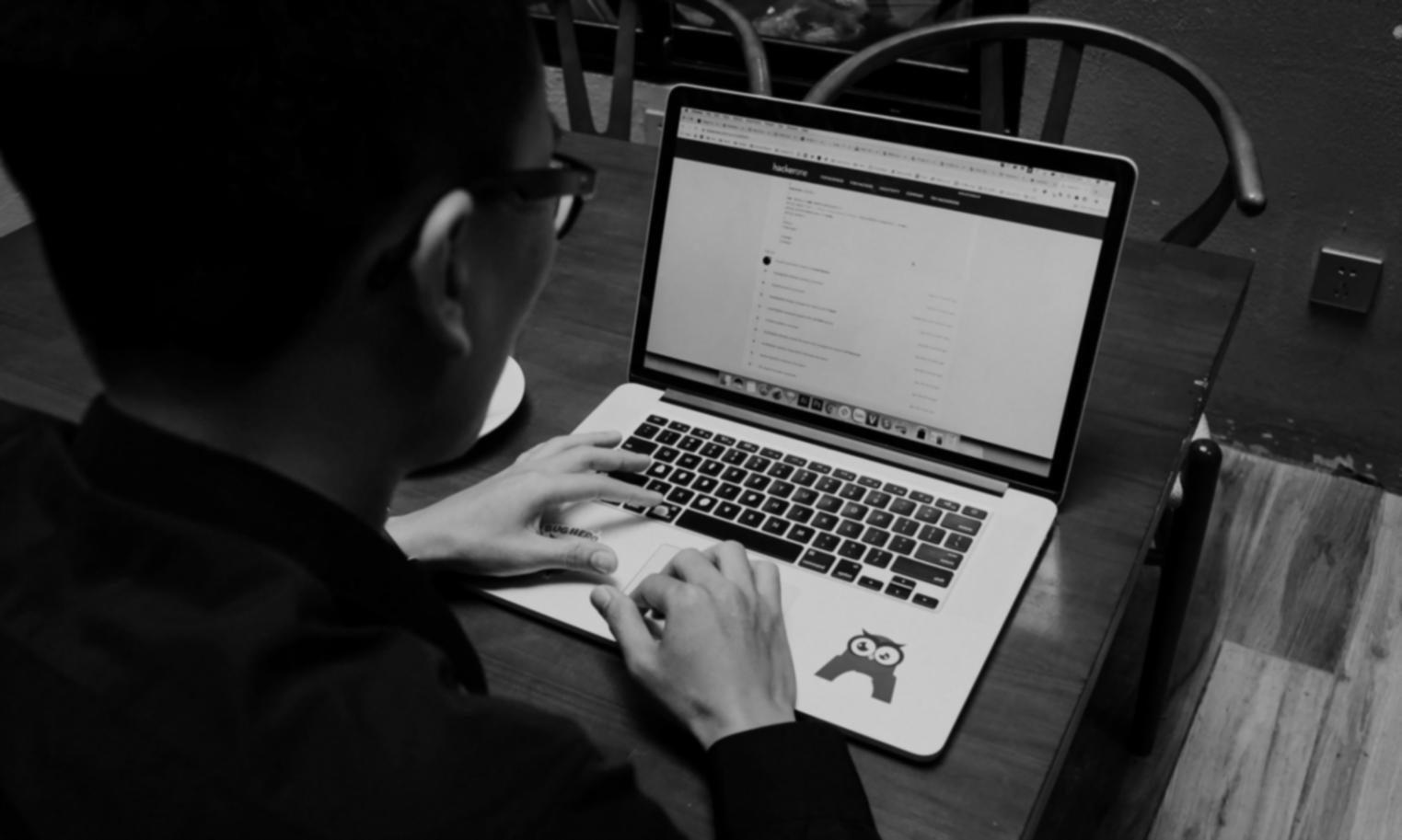 Cybersecurity professional working on threat analysis in modern security operations center